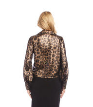 Load image into Gallery viewer, Woman wearing a leopard print blouse and black skirt against a white background.
