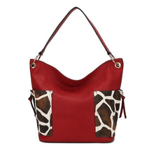 Load image into Gallery viewer, Crafted from superior vegan leather, this hobo bag features stylish gold-tone hardware and a slouchy silhouette. Boasting a spacious interior with a mid-centered zipper pocket, two slip in pockets, and a wall zipper pocket, the bag is also designed with two slip-in pockets on either side in a fashionable animal print.  
