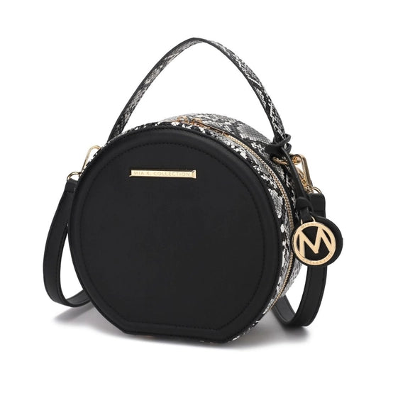 This Mallory Cross-body offers luxurious style, featuring high-quality vegan leather with gold tone embellishments and hand-painted edges in snake print. It features a top zipper closure, two interior pockets, and one interior zipper pocket with the signature Mia K. Collection Plate. This cross-body has a circle one-compartment style and adjustable strap for optimal comfort.   Color- Black. High-quality vegan leather. Luxurious gold tone embellishments. Crossbody style.
