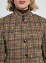 Load image into Gallery viewer, A close-up of a model wearing a brown and sparkle blazer against a white background.
