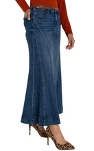 Load image into Gallery viewer, Our Mermaid Maxi Skirt features five pockets and is crafted from premium, soft, stretchable denim that conforms to your movements, guaranteeing comfort, style, and an impeccable fit throughout the day!
