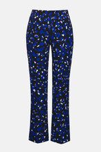 Load image into Gallery viewer, Blue and black patterned pants against a white background.
