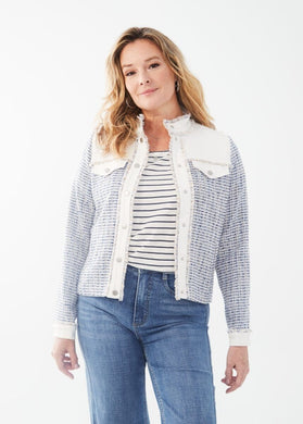 This mixed media jacket, made of both textured twill and tweed, provides a versatile and stylish option. The hems feature a slight fray in the indigo mix, adding a touch of flair. Color- Indigo mix. Front button closure, Band neckline. Flap pockets at the bust, Slanted side pockets,