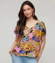 Load image into Gallery viewer, Expertly crafted from luxurious cupro fabric, this top combines tropical charm with a relaxed sophistication. The Dolman sleeves add a touch of casual elegance, creating a comfortable and laid-back fit that effortlessly complements your style. With its vibrant and breezy design, this top is perfect for any occasion.
