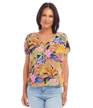 Load image into Gallery viewer, Expertly crafted from luxurious cupro fabric, this top combines tropical charm with a relaxed sophistication. The Dolman sleeves add a touch of casual elegance, creating a comfortable and laid-back fit that effortlessly complements your style. With its vibrant and breezy design, this top is perfect for any occasion.
