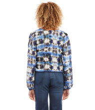 Load image into Gallery viewer, This stylish and practical piece features a free-flowing, blouson fit along with an eye-catching tie-dye pattern. A stunning combination of dark tones, light shades of blue, and a touch of mint green brings a dynamic look. Paired with formal black or navy trousers or denim, it&#39;s a great way to upgrade your wardrobe. Color- Black, blues, grey, hint of mint greens. Blouson design. Tie dye. V-neck. Elasticized hem. Lined. Fabric -Tie dye bubble cloth: 98% Polyester. 2% Elastane.
