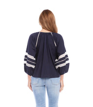 Load image into Gallery viewer, Lightweight cotton gives a breezy quality to this peasant top detailed with charming embroidery. This breezy top pairs perfectly with white pants for a fresh beachy look. Comes in both regular and plus sizes. Colors- Navy and white. Blouson sleeve V-neck Embroidered.
