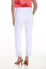 Load image into Gallery viewer, The Frank Lyman Pant is a timeless addition to any wardrobe, blending sophistication and comfort effortlessly. Designed with a soft off-white hue, these pants exude elegance, making them perfect for any occasion.&nbsp; The Onike features a beautifully detailed hem that adds a touch of elegance and sophistication. The ankle-length design is enhanced with intricate embroidery and cut-out accents, creating a refined yet modern aesthetic.

