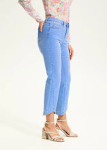 Load image into Gallery viewer, A perfect balance of classic and contemporary, the Olivia Boot Ankle Denim is designed for effortless style and comfortable wear. Featuring a light-washed finish, a curved hem, and a removable sash belt, this jean offers a flattering silhouette that transitions seamlessly from casual to chic.
