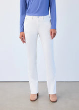 Load image into Gallery viewer, Model wearing creme colored corduroy denim pants, blue top and tan boots against a white wall.
