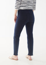 Load image into Gallery viewer, The contoured waistband of the Olivia Slim Ankle Jean in Navy by FDJ-French Dressing comfortably sits just below the natural waistline. This classic wardrobe staple has a trendy twist, featuring an ankle length style with slight frayed hems.  Color- Navy. Button and zipper closure. Slight fray at the bottom hems. Ankle length. Inseam- 28&quot;.
