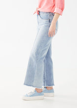 Load image into Gallery viewer, This ankle-grazing wide leg jean offers a modern and effortlessly chic style. With a pale blue wash, it pairs seamlessly with almost any top for a versatile look.&nbsp;&nbsp;
