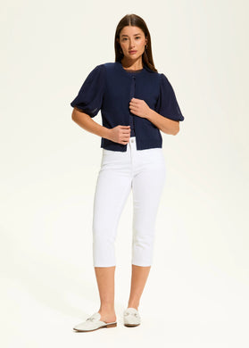 These capris in a crisp white color, feature tiny, sparkling rhinestone embellishment on the front of each leg, adding a touch of sparkle and elegance to their design. With a mid-rise waist, slim leg shape, and a cropped length of 21 inches, they offer a flattering and polished look.