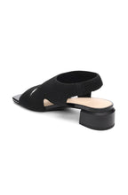 Load image into Gallery viewer, These stylish black slip-on sandals combine fashion and comfort, thanks to a flexible knit fabric and sleek organic heel. Elevate your look while staying comfortable all day long.
