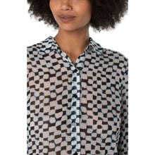 Load image into Gallery viewer, Introducing the Pippa Painted Checks Button Up Woven Blouse. This fashion-forward piece showcases an abstract pattern in shades of blue on a white background, making it a must-have for any season. Pair it with your favorite denim for a stunning ensemble. For added coverage, we recommend layering the Pippa top with a tank or cami as the top is slightly sheer.  Color- Blues and white. Button down. Long sleeve.
