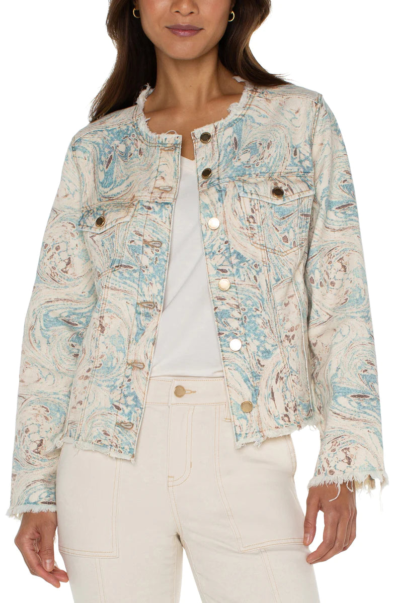 Make a statement with our contemporary jean jacket! Its frayed hem and eye-catching ecru and turquoise marbled print will bring a unique sense of elegance and personality to your wardrobe.  