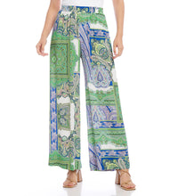 Load image into Gallery viewer, Celebrate the free-spirited style of bohemian-chic charm in these wide-leg pants. Crafted from soft viscose, they feature a lively paisley patch print, practical pockets, and a convenient elastic waist for maximum comfort.
