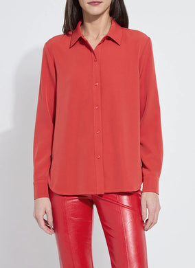 Model wearing a red shirt and red pants against a white background.