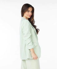 Load image into Gallery viewer, Opt for the Pietta Pastel Green Blazer Linen Look - EsQualo SP2410008 with smocked sleeves for a polished and stylish touch. Whether you&#39;re going for a casual spring look in cute jeans or a more refined look with our Pistachio-colored Cate City Trousers - EsQualo SP2410025, this blazer is the perfect choice.
