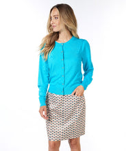 Load image into Gallery viewer, Experience luxurious comfort with our Tamara cardigan. Its soft knit fabric provides a cozy fit. This cardigan, featuring puff sleeves and sparkling etched silver buttons adds a stylish and lively touch to any ensemble. An indispensable piece for a fashionable and adaptable look!  Color - Turquoise. Button down. Silver etched buttons. Puff sleeve detailing.
