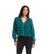 Load image into Gallery viewer, Woman wearing a teal cardigan with pearl buttons and black pants against a white background.
