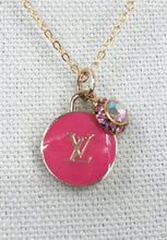 Load image into Gallery viewer, With its delicate and attention-grabbing design, the Permelia Pink Vintage Louis Vuitton Zipper Pull and Iridescent Charm Necklace is a one-of-a-kind piece that reflects your individuality. Its playful and flirtatious nature is sure to elevate any ensemble.
