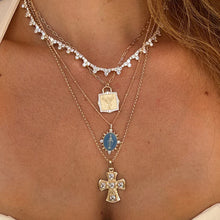 Load image into Gallery viewer, Close-up of a model wearing multiple necklaces with pendants.
