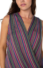 Load image into Gallery viewer, Accentuate your wardrobe with our sleeveless V-neck, front draped knit top. Fashioned with an ultra-soft knit, this top displays a comfortable, fun style. Lovely worn on its own or under a favorite jacket or blazer.   Looks gorgeous paired under our Portia Pink Topaz Button Closure Boyfriend Blazer- Liverpool Los Angeles LM1148MW1.  Color- Text Multi Stripe - Pink, green, white, black. V-Neck. Drape front.
