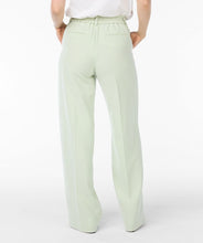 Load image into Gallery viewer, These gorgeous City Trousers in Pistachio are back in stock. With an elastic waistband and a wide leg design, they provide both comfort and style. Dress them up with heels or down with sneakers - the choice is yours. A must-have for any fashion-savvy wardrobe.
