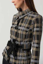 Load image into Gallery viewer, This versatile jacket boasts a funnel collar and a belt-cinch closure to achieve a sharp silhouette. Paired with cropped sleeves and button fastenings, this signature plaid pattern offers an elegant touch. Crafted to last, this timeless design promises a sophisticated look that will remain timeless.  Color- Black, white and tan. Black buttons. Cinch belt. Funnel collar. Crop sleeves. Nonfunctional pockets.
