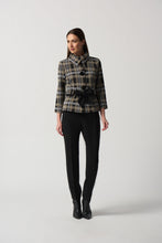 Load image into Gallery viewer, This versatile jacket boasts a funnel collar and a belt-cinch closure to achieve a sharp silhouette. Paired with cropped sleeves and button fastenings, this signature plaid pattern offers an elegant touch. Crafted to last, this timeless design promises a sophisticated look that will remain timeless.  Color- Black, white and tan. Black buttons. Cinch belt. Funnel collar. Crop sleeves. Nonfunctional pockets.
