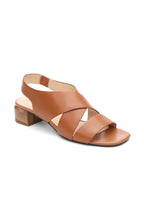 Load image into Gallery viewer, Effortlessly make a fashion statement with our Pomona sandal in fashionable luggage shade, offering both comfort and refined style. Skillfully designed with elegant cognac leather and a sleek wood finished heel for an upscale look.
