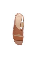 Load image into Gallery viewer, Effortlessly make a fashion statement with our Pomona sandal in fashionable luggage shade, offering both comfort and refined style. Skillfully designed with elegant cognac leather and a sleek wood finished heel for an upscale look.
