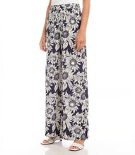 Load image into Gallery viewer, These boho-inspired wide-leg pants are a statement piece that invites you to embrace the beauty of botanical print in every step. Sumptuous viscose fabric provides a cool and comfortable feeling to the touch for a relaxing feeling wherever your day takes you.
