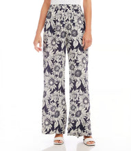 Load image into Gallery viewer, These boho-inspired wide-leg pants are a statement piece that invites you to embrace the beauty of botanical print in every step. Sumptuous viscose fabric provides a cool and comfortable feeling to the touch for a relaxing feeling wherever your day takes you.
