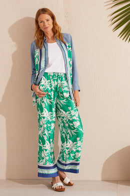 Flowy and vibrant, these printed pants feature a wide leg design and lush botanical print. They're designed with a 30'' inseam, drawstring waist, and convenient side pockets. Pair with a basic white shirt or tee and your favorite sandals and you will be ready to face the day in style.