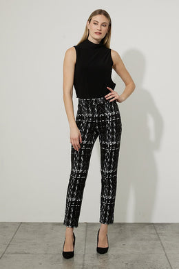This straight-leg Joseph Ribkoff pant offers a slim fit and smooth appearance. Complement the vibrant patterning with a solid top for a standout outfit. Color- Black and white. Elastic waist. No pockets. No zipper. Not lined. Straight leg. Fabric -38% Polyester. 30% Nylon. 30% Viscose Rayon. 2% Spandex.