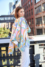 Load image into Gallery viewer, Emphasize your style with a striking combination of colors and a beautiful abstract design. This moto style jacket features a sleek metallic faux leather exterior, a vibrant swirl print, and faux zip details to add a touch of edginess. Versatile for dressing up or wearing casually. Color- White, coral, pink, lavender, gold, light blues. Metallic printed vegan pleather. Liquid Spring Pucci print with metallic finish. Hook &amp; eye closure. Zipper trim.
