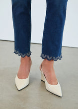 Load image into Gallery viewer, Ankle length blue jeans with rhinestone scalloped hems and off-white heels against a white background.
