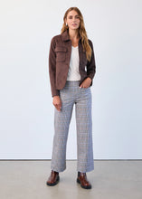 Load image into Gallery viewer, Woman wearing a brown jacket, white shirt, plaid pants and brown boots against a white background.
