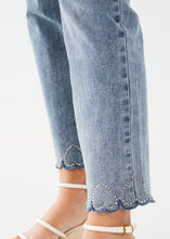 Load image into Gallery viewer, This pull-on straight ankle denim offers both comfort and style with its unique design. The bottom hems are adorned with playful upside-down hearts made of sparkling rhinestones. This fabulous jean is a fun and flirty addition to any wardrobe.
