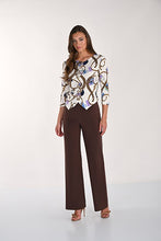Load image into Gallery viewer, A woman modeling a three-quarter sleeve top with a white base and brown, blue, and purple abstract swirl pattern, paired with dark brown straight-leg trousers, against a light gray studio background.
