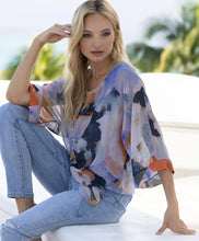 Load image into Gallery viewer, Flowy, light and easy, this gorgeous multi color print top is a must have for the warmer months.  A side tie and flowy sleeves create a style that can easily transition from day to evening. Pair with our   Colors - Purple multi. Pullover. Side tie. Flowy design. Abstract print. Fabric -100% Polyester.
