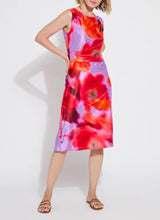Load image into Gallery viewer, The Lysse Raquel Side Drape Printed Dress is a chic and elegant dress featuring a side drape design that adds a touch of sophistication. Fully lined for structure with light mesh, the Raquel is crafted from lightweight fabric in a striking color combination, making it perfect for both casual and formal occasions.
