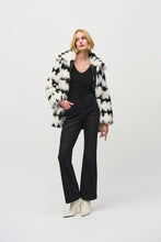 Load image into Gallery viewer, This stunning coat will surely make heads turn as you make an entrance. Combining luxurious faux fur with a striking black and white geometric pattern, this reversible coat adds a touch of chic French sophistication. It features practical pockets and a buttoned closure, seamlessly blending avant-garde fashion with timeless grace in a sleek and compact form.
