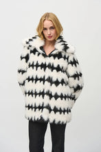 Load image into Gallery viewer, This stunning coat will surely make heads turn as you make an entrance. Combining luxurious faux fur with a striking black and white geometric pattern, this reversible coat adds a touch of chic French sophistication. It features practical pockets and a buttoned closure, seamlessly blending avant-garde fashion with timeless grace in a sleek and compact form.
