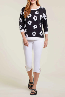 Enhance your style with the versatile Rosalie Reversible Three Quarter Sleeve Crew Neck Sweater by Tribal. This unique sweater features a reversible design, allowing you to effortlessly switch up your look. The three-quarter sleeves and crew neck offer a classic and comfortable fit, perfect for any occasion.