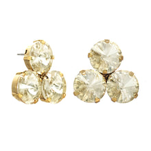 Load image into Gallery viewer, For an enduring glitter, choose the Reya Earrings from Canada! Measuring 1”, these studs with three round premium champagne crystals are crafted with brass base metal, gilded with antique gold.  Furthermore, the surgical steel posts keep the earrings securely in place for lasting sparkle.  Color- Gold and champagne. Diameter- I inch. Antique gold plating over brass. Premium crystals. Surgical steel posts.

