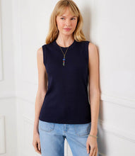 Load image into Gallery viewer, Woman wearing a navy sleeveless tank top, long stone necklace and light blue jeans against a white wall.
