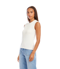 Load image into Gallery viewer, Woman wearing an off-white sleeveless tank top and light blue jeans on a white background.
